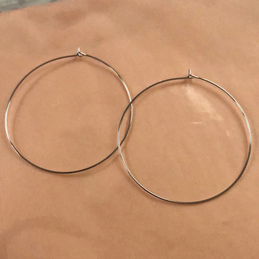 medium size thin hoops. hook on back